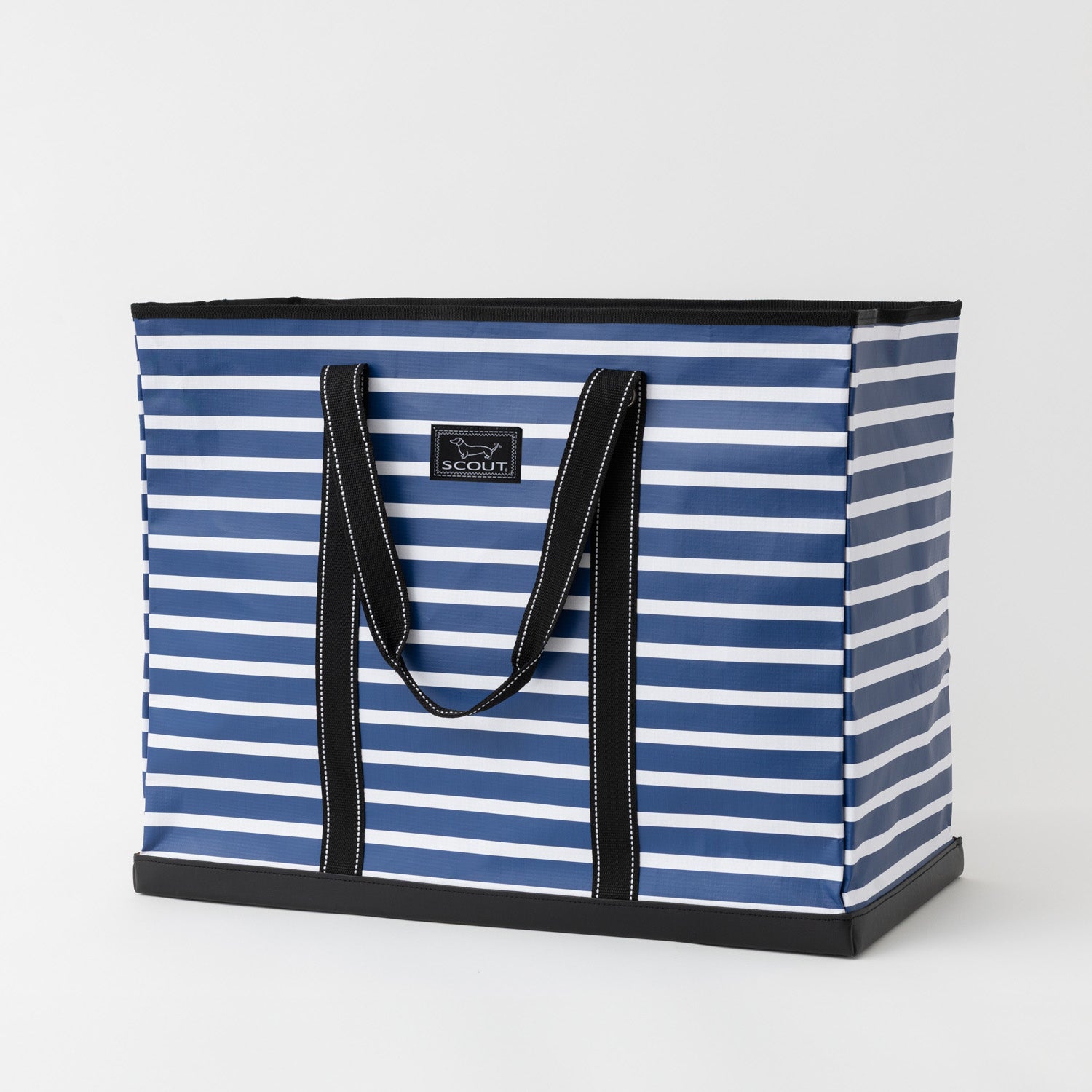 Blue and white striped tote bag with black handles on a light gray background