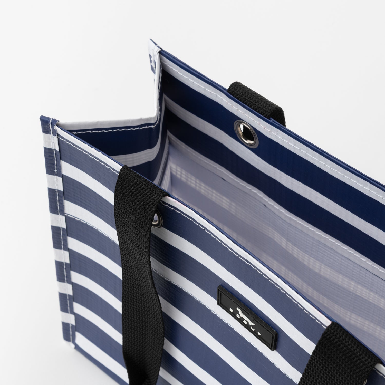 Blue and white striped bag with black handles on a white background