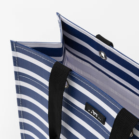 Blue and white striped bag with a black handle on a white background