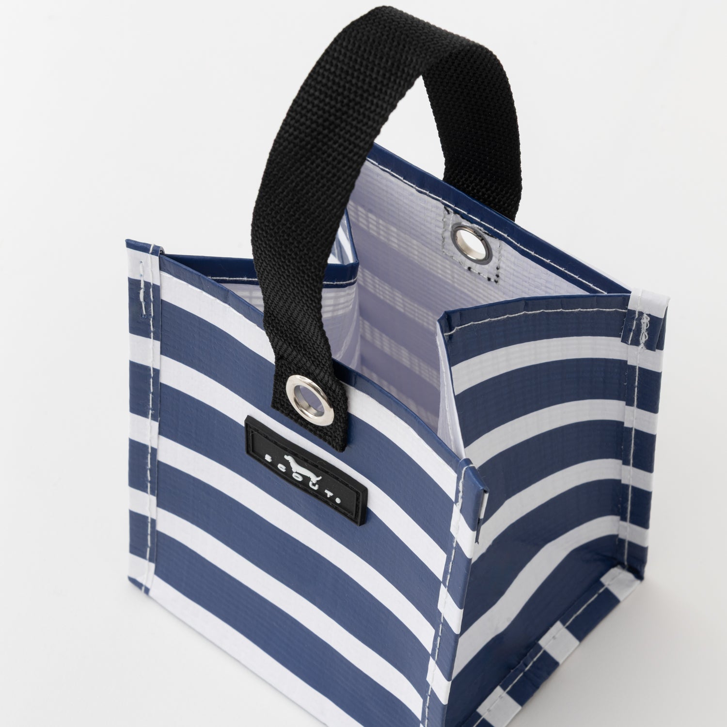 Blue and white striped tote bag with a black handle on a light gray background