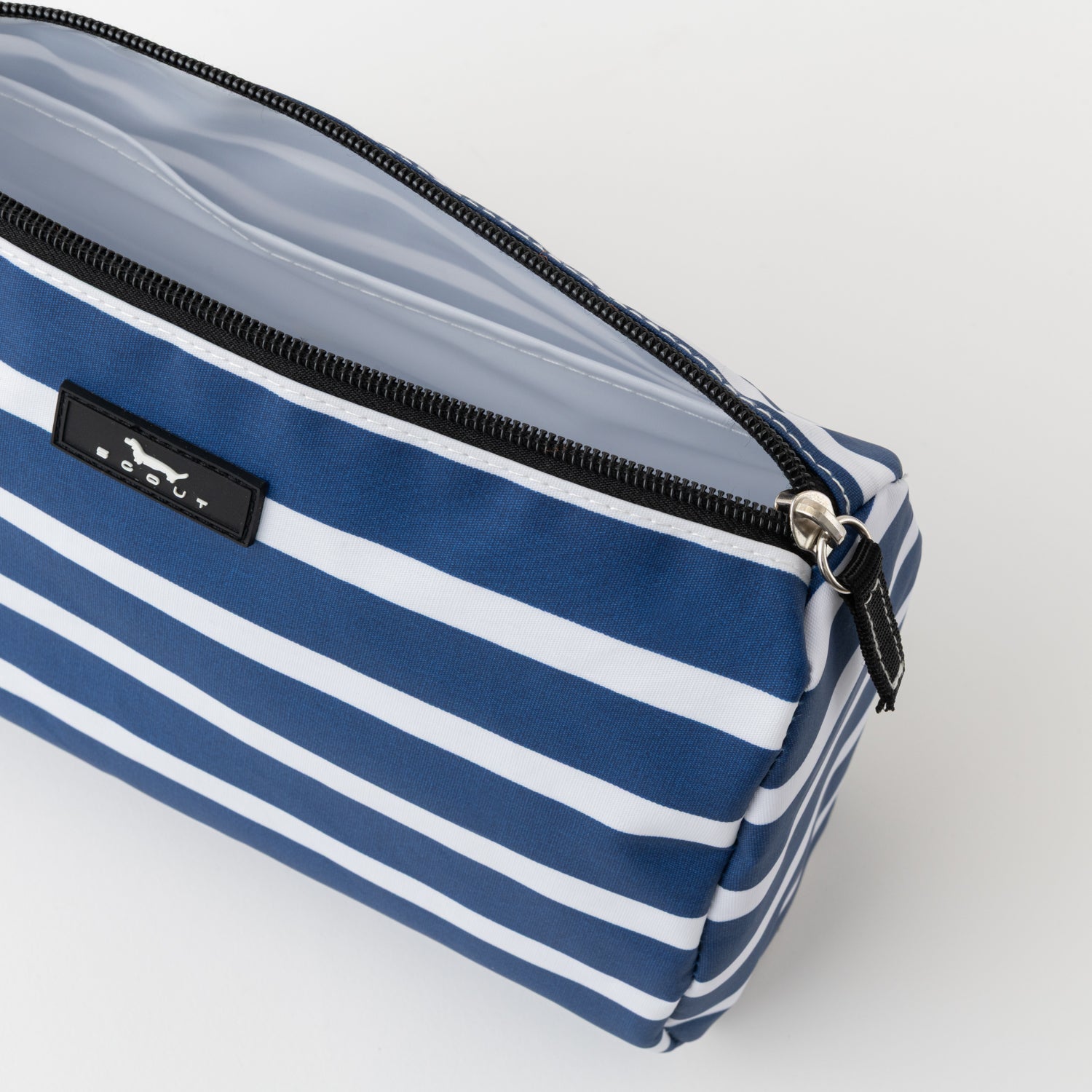 Blue and white striped pouch with a brand label on a light gray background