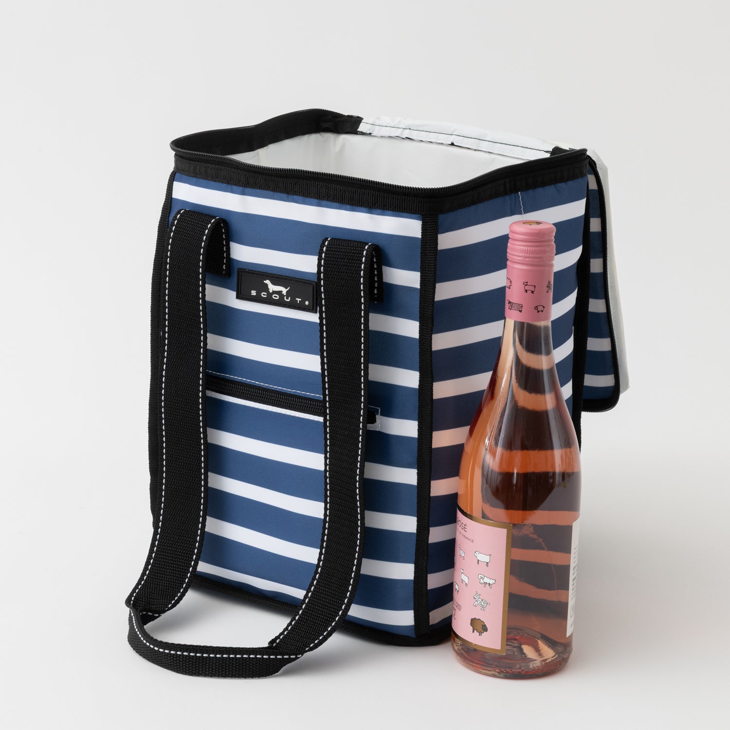 Blue and white striped cooler bag with a bottle of pink wine on a white background