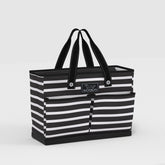 Black and white striped tote bag with 'Scout' logo on a light gray background