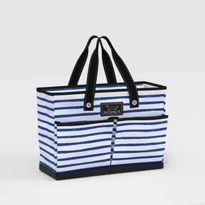 Blue and white striped tote bag with black handles on a light gray background