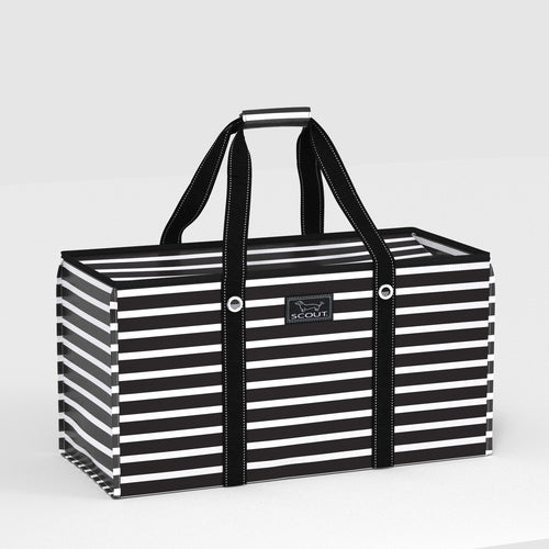 Black and white striped tote bag with 'SCOUT' logo on a light gray background