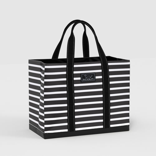 Black and white striped tote bag with 'SCOUT' logo on a light gray background