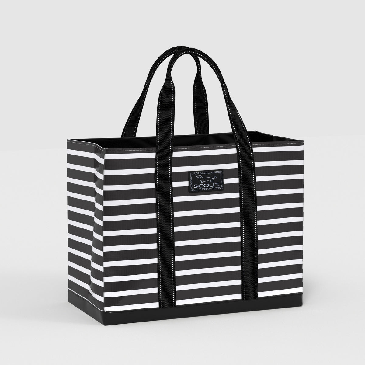 Black and white striped tote bag with 'SCOUT' logo on a light gray background