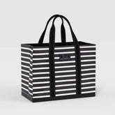 Black and white striped tote bag with 'SCOUT' logo on a light gray background