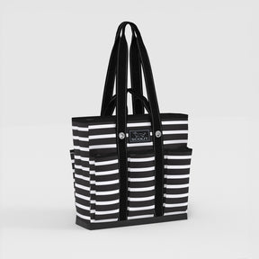 Black and white striped tote bag with 'SCOUT' logo on a light gray background