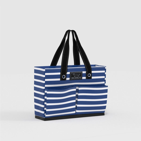 Blue and white striped tote bag with black handles on a light gray background