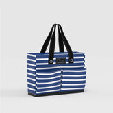 Blue and white striped tote bag with black handles on a light gray background