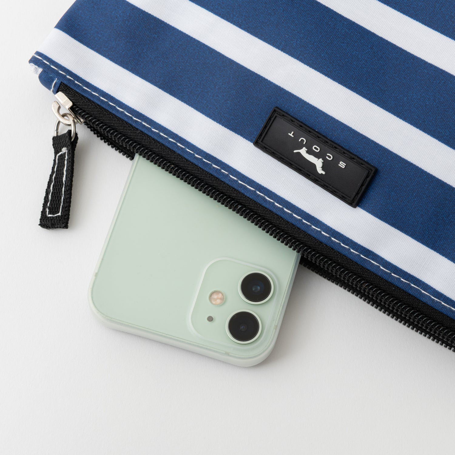 Blue and white striped pouch with a phone inside on a light gray background
